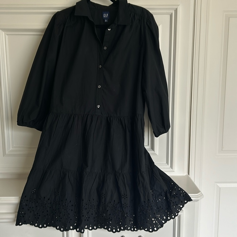 COPY - This adorable tiered dress by Gap. 38 inches long and puff elastic sleev…